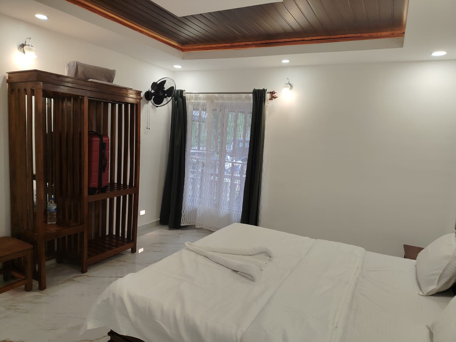 Guest bedroom with wooden wardrobe