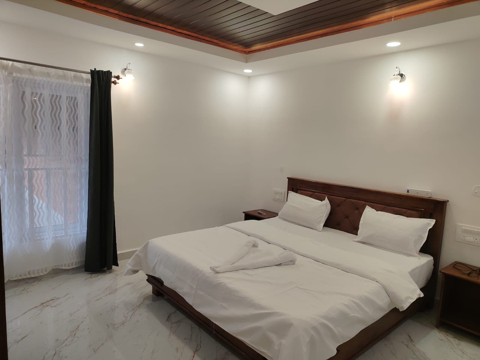 Deluxe bedroom with leather headboard