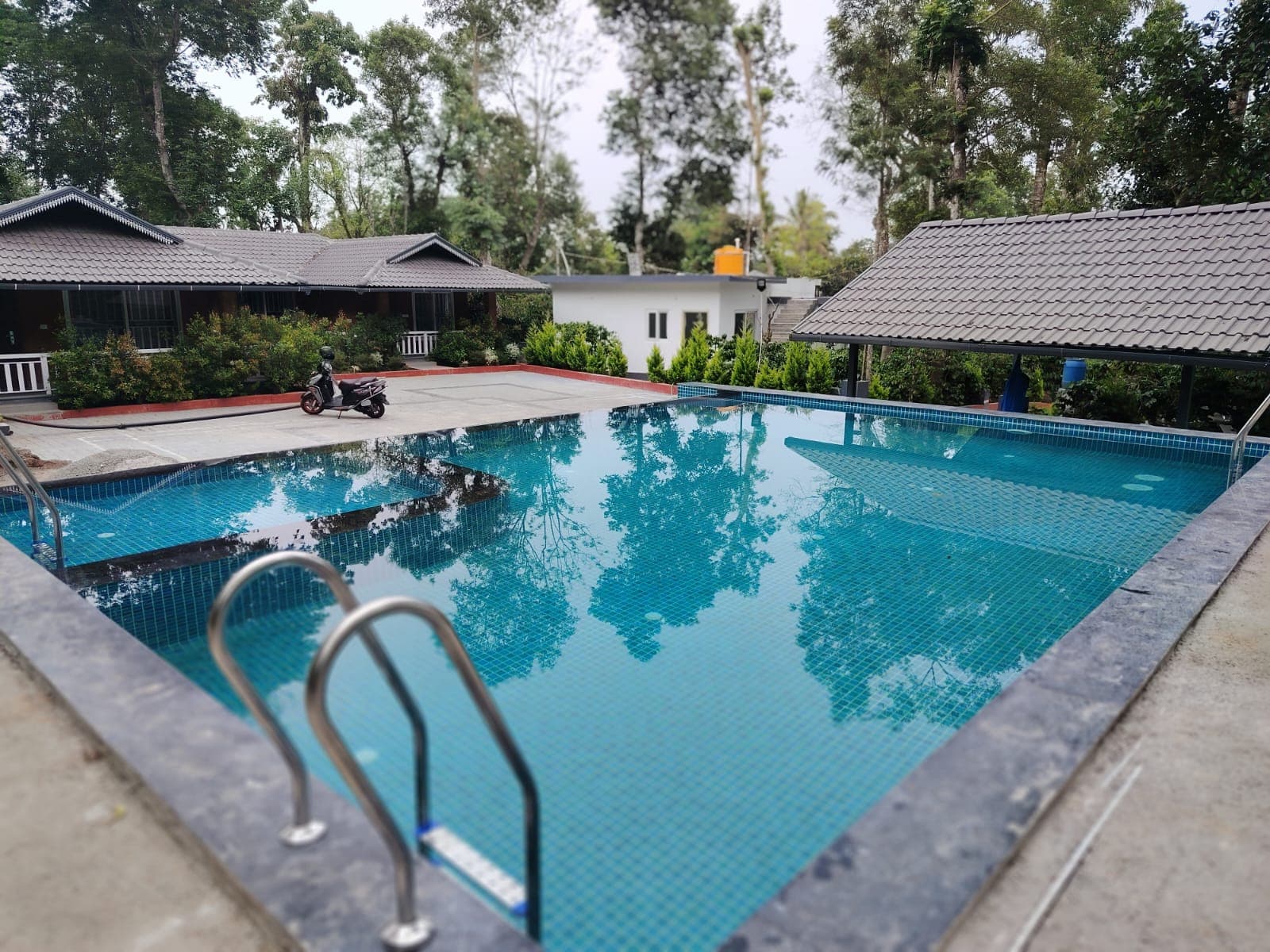 Estate grounds overlooking the swimming pool and cottages